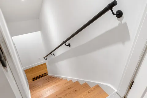 a view of outdoor space with green field and trees