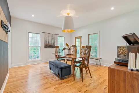 a room with furniture and a large window