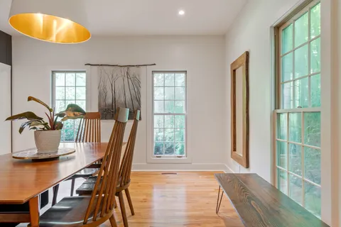a living room with furniture and a table