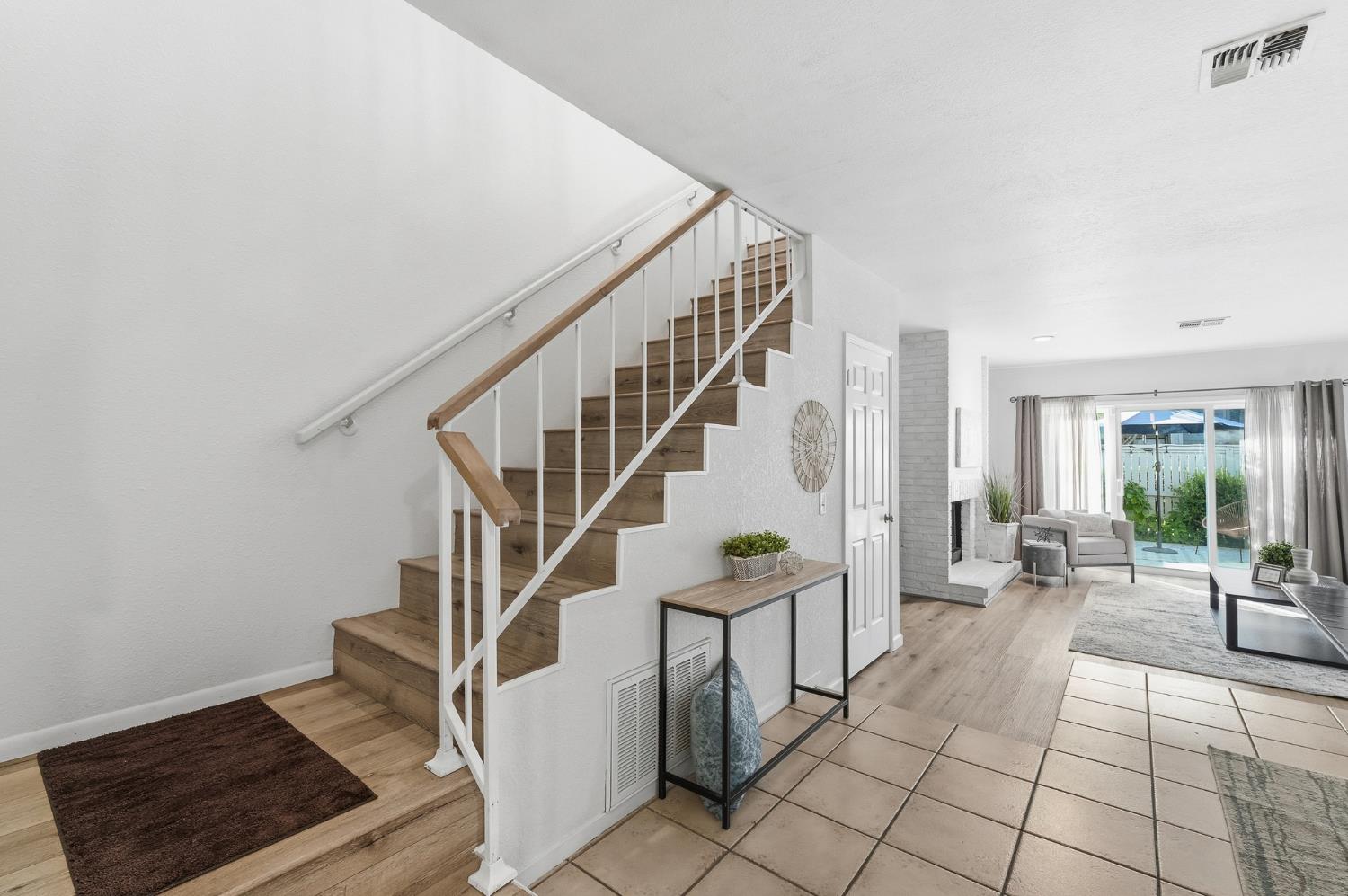 230 West Rumble Road, Unit C Modesto, CA 95350 - Photo 20 of 54 a view of entryway and hall with wooden floor
