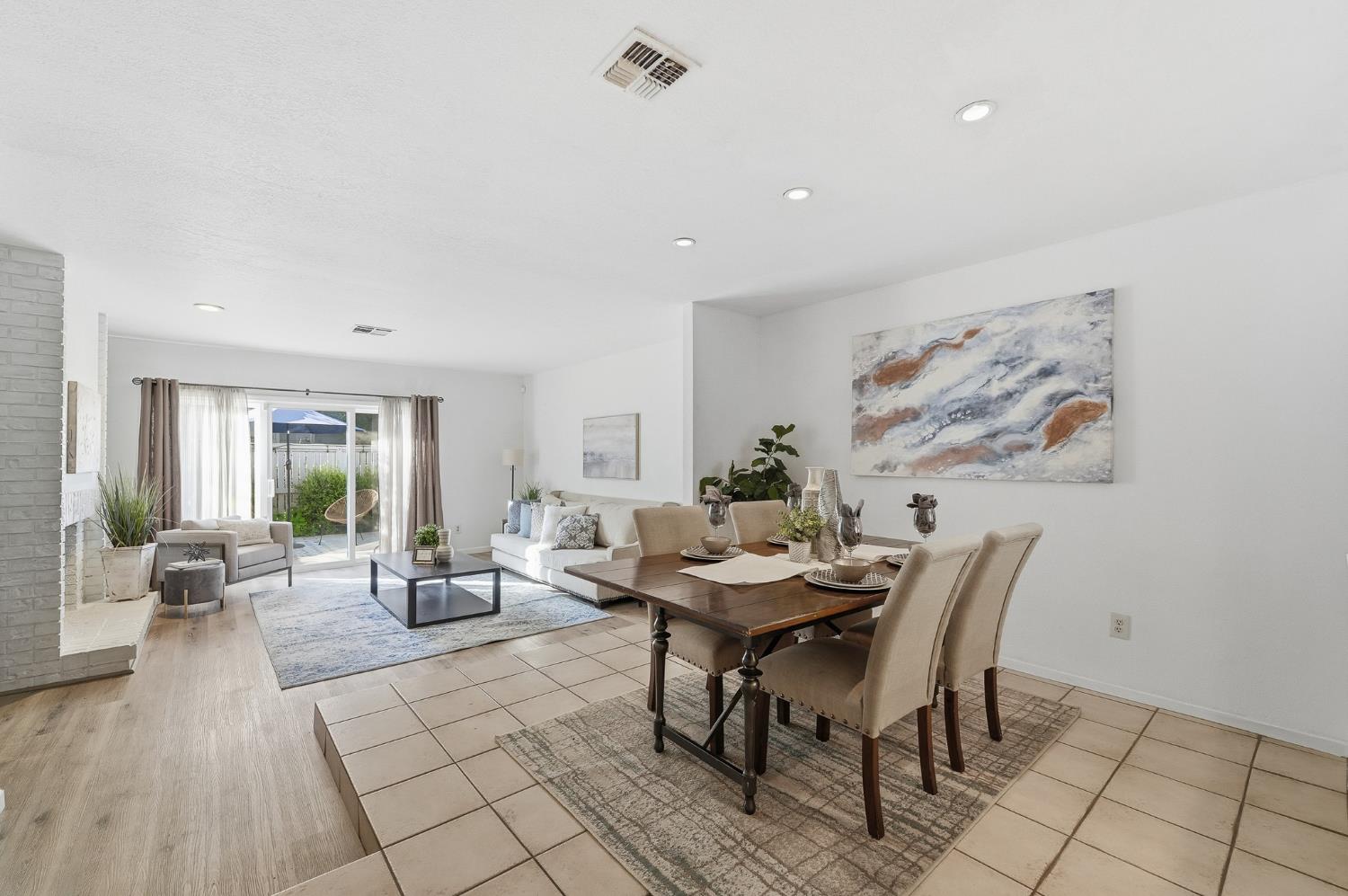 230 West Rumble Road, Unit C Modesto, CA 95350 - Photo 21 of 54 a living room with furniture and a large window