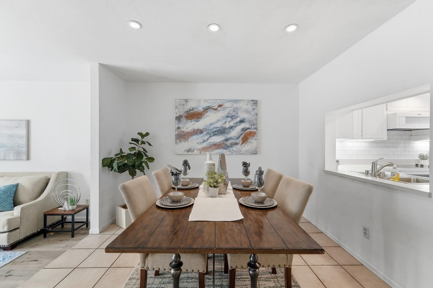 230 West Rumble Road, Unit C Modesto, CA 95350 - Photo 23 of 54 a view of a dining room with furniture
