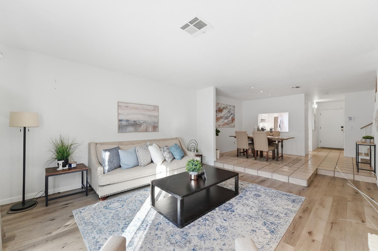 230 West Rumble Road, Unit C Modesto, CA 95350 - Photo 29 of 54 a living room with furniture and wooden floor