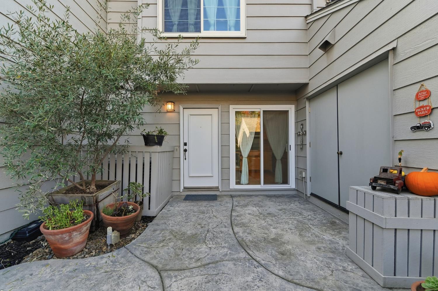 230 West Rumble Road, Unit C Modesto, CA 95350 - Photo 10 of 54 a view of a porch with furniture and floor to ceiling window
