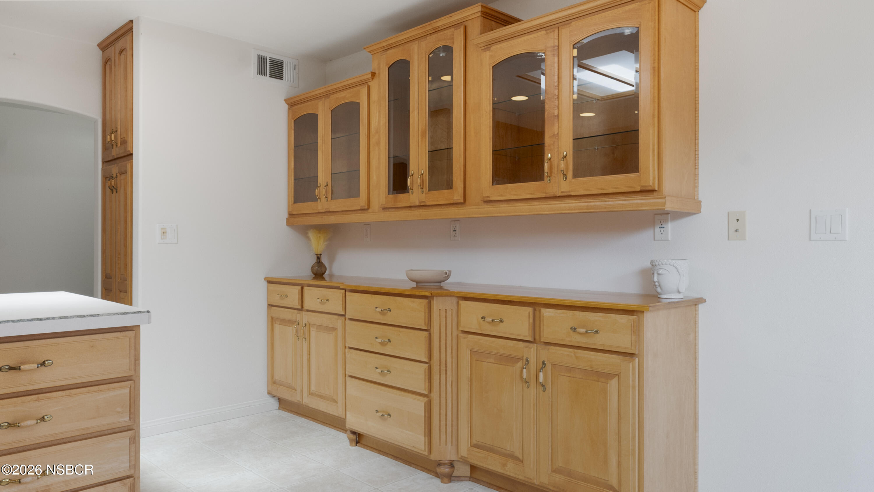 1312 North First Place Lompoc, CA 93436 - Photo 8 of 38 a view of cabinets and window