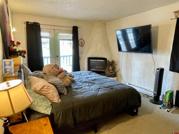 a view of a room with wooden walls