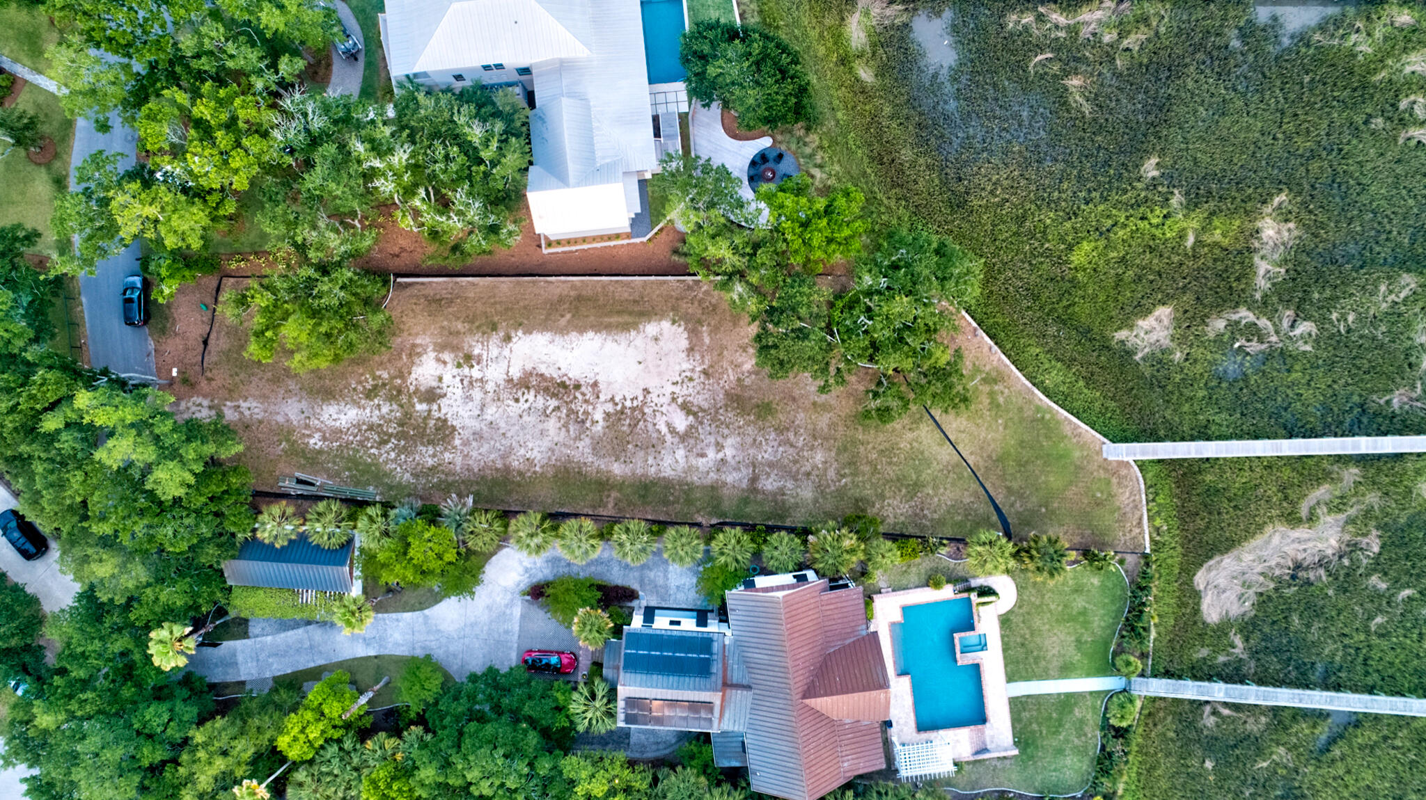 108 Beach Street Mount Pleasant, SC 29464 - Photo 4 of 14 108 Beach Twilight Drone - 006 - CMG