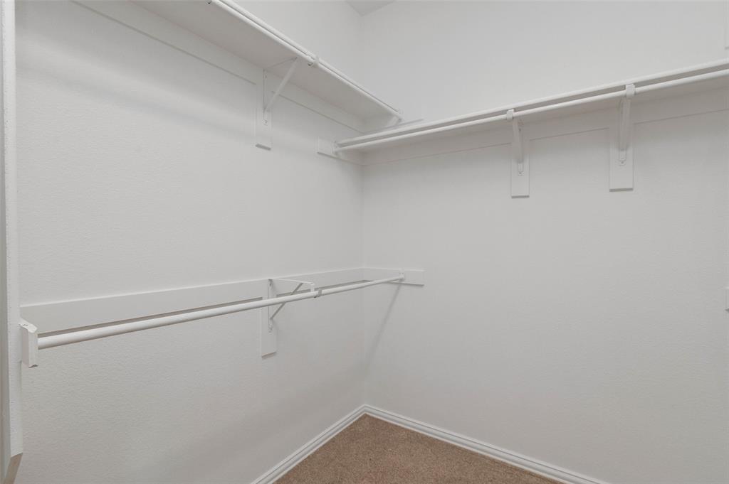 7509 Barrymore Road Denton, TX 76208 - Photo 21 of 40 Primary closet