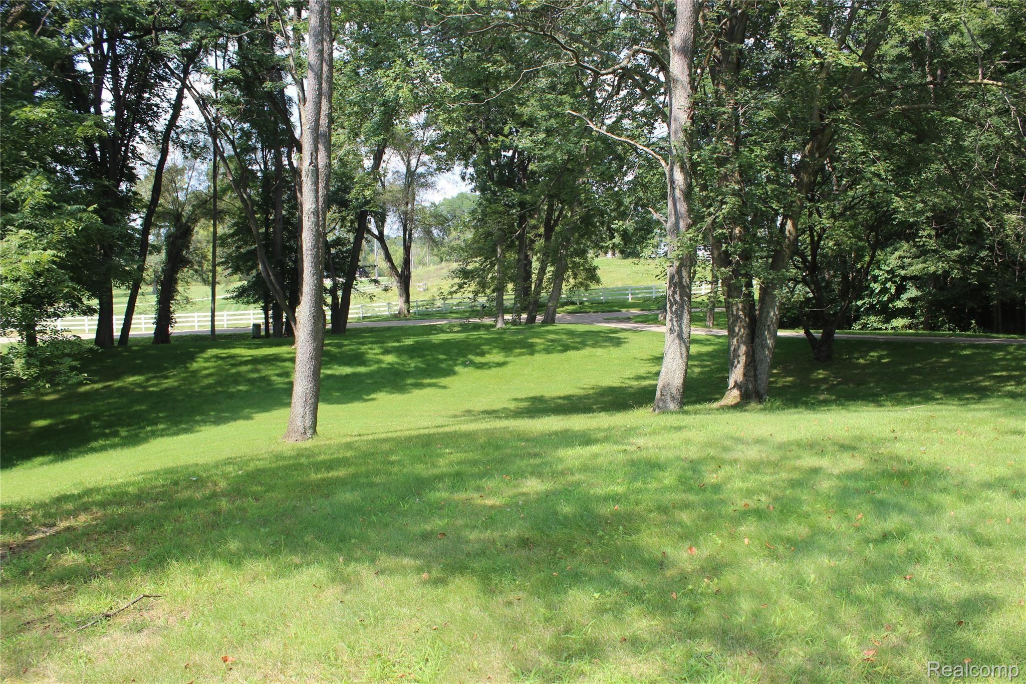 6095 Walsh Road Dexter, MI 48130 - Photo 3 of 35 Sits far back from Walsh Rd.