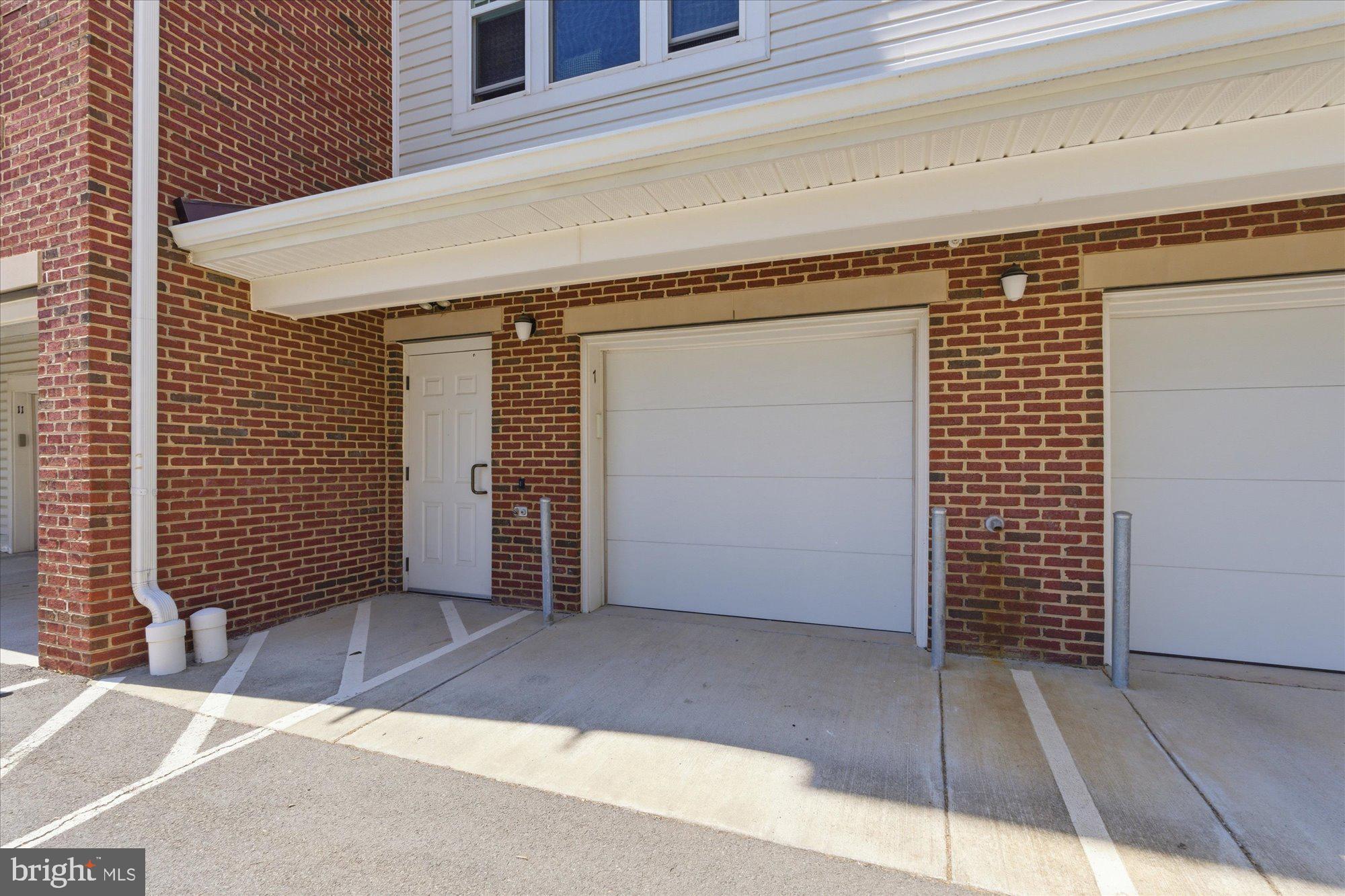 20650 Hope Spring Terrace, Unit 301 Ashburn, VA 20147 - Photo 32 of 35 One-car garage