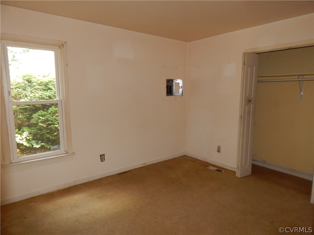 7143 Full Rack Drive Midlothian, VA 23112 - Photo 5 of 15 an empty room with a window
