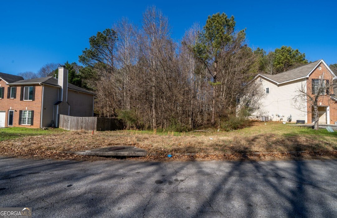3322 River Runt Trail Decatur, GA 30034 - Photo 17 of 19 a view of a house with a yard
