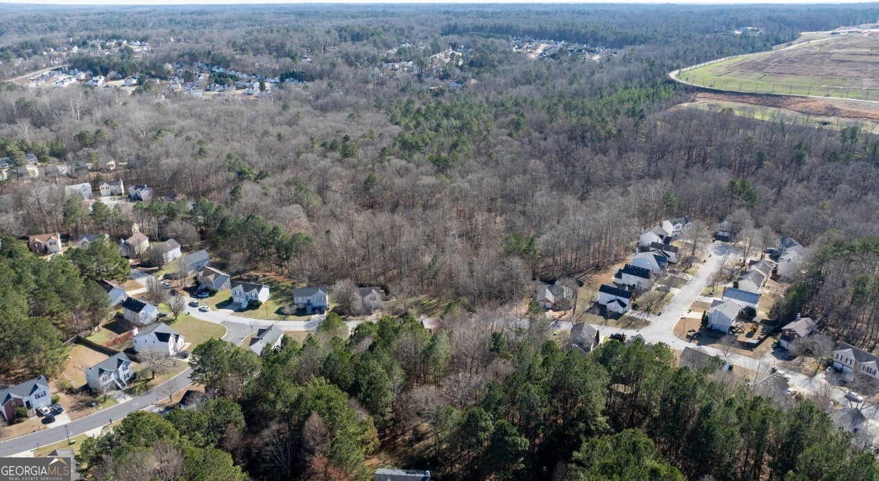 3322 River Runt Trail Decatur, GA 30034 - Photo 9 of 19 an aerial view of a house with a yard and large tree