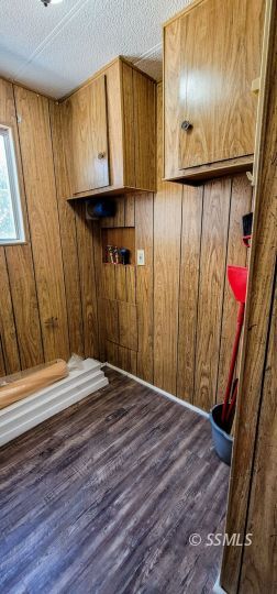 1402 North Downs Street Ridgecrest, CA 93555 - Photo 11 of 15 a view of a room with wooden floor and chair