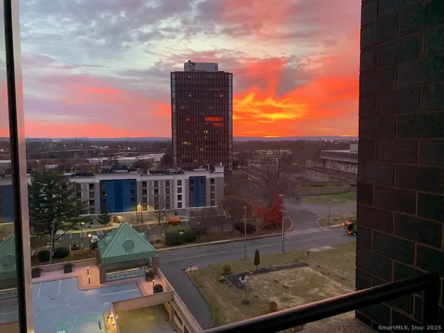 view of a lake with a building in the background