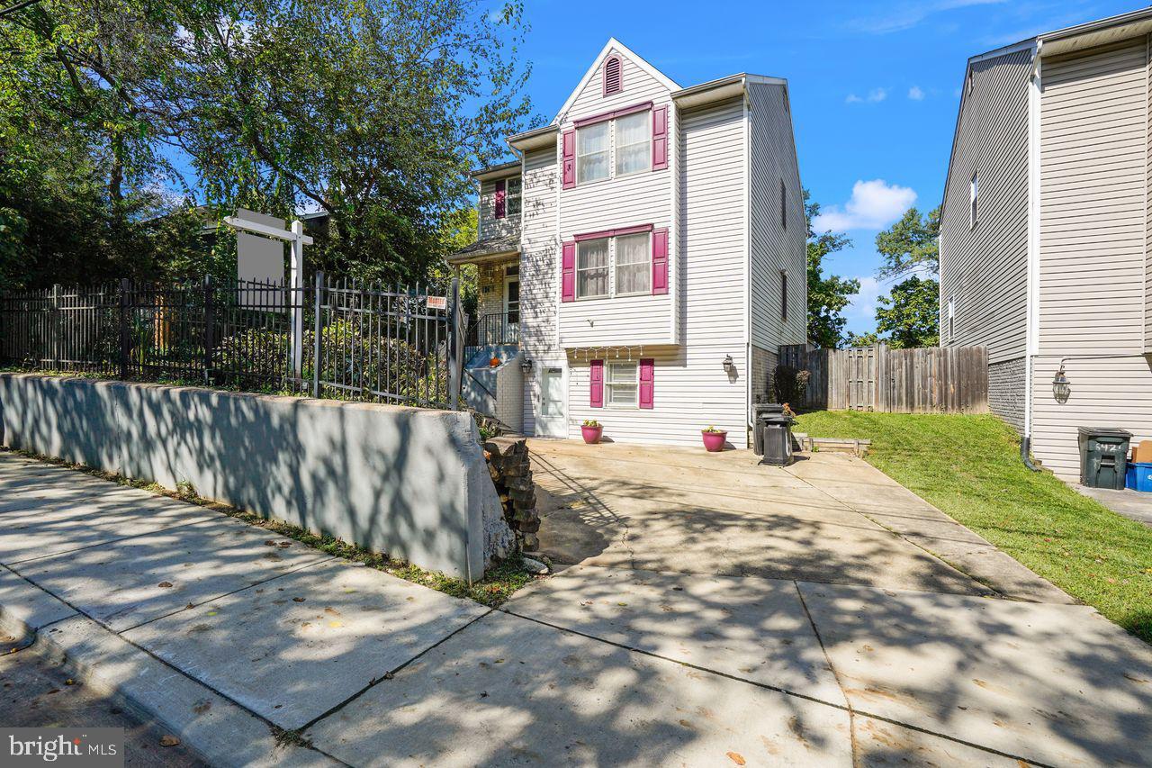 6418 Sligo Mill Road Takoma Park, MD 20912 - Photo 2 of 40 Front view with fenced front yard
