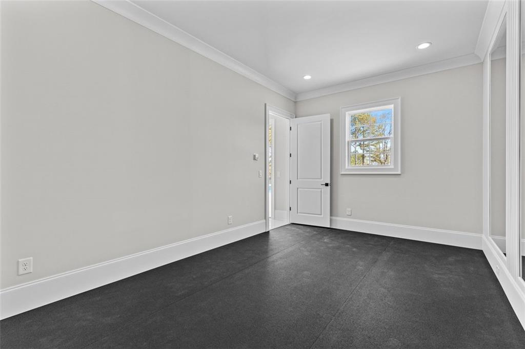2355 Luke Edwards Road Dacula, GA 30019 - Photo 102 of 115 an empty room with a empty space and window