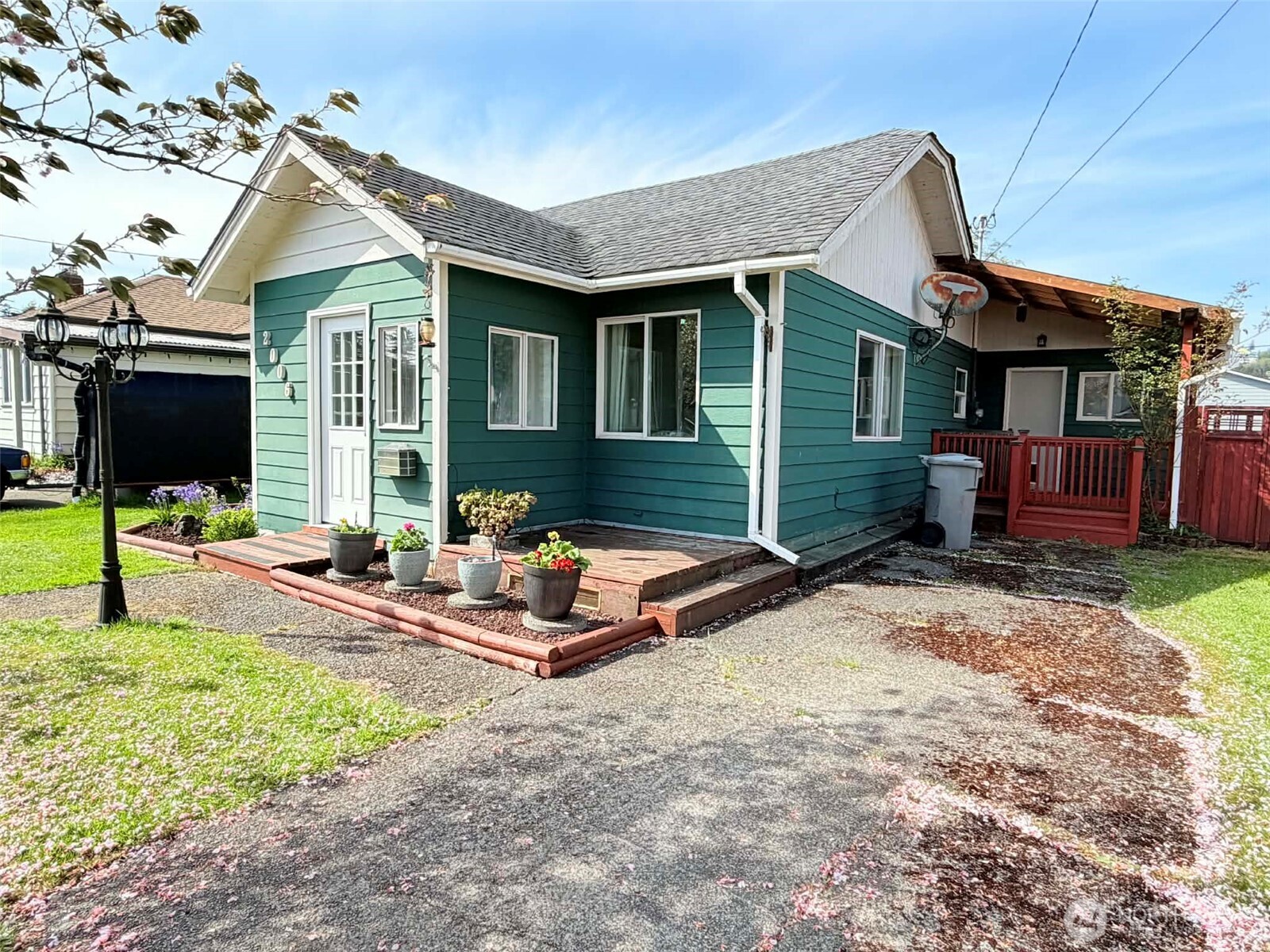 2006 West Second Street Aberdeen, WA 98520 - Photo 4 of 39 a front view of a house with yard porch and furniture