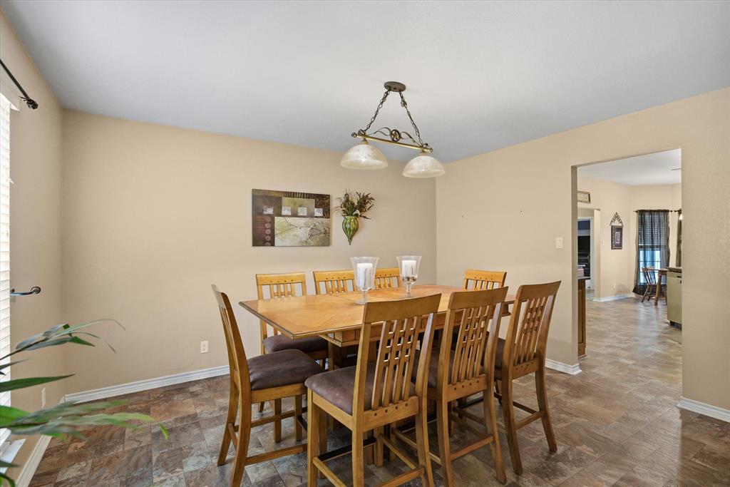 9111 County Road 313 Terrell, TX 75161 - Photo 15 of 40 a view of a dining room with furniture