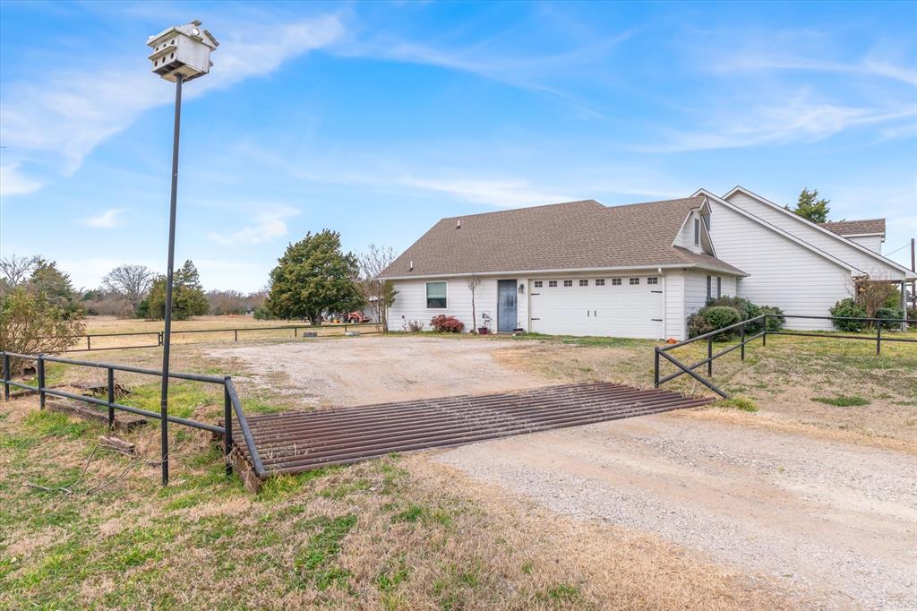 9111 County Road 313 Terrell, TX 75161 - Photo 4 of 40 a house view with a outdoor space