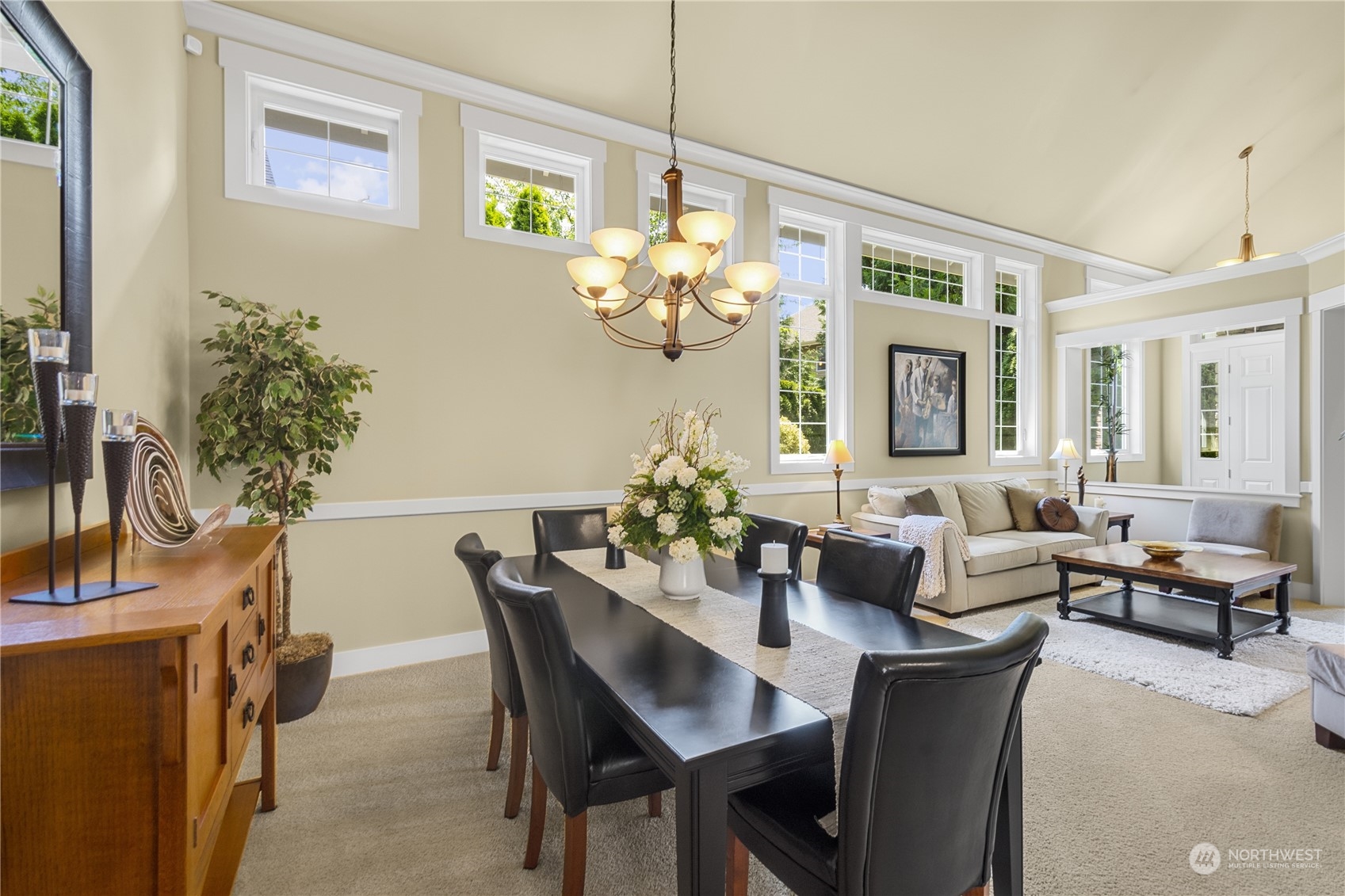 4205 221st Place Southeast Bothell, WA 98021 - Photo 11 of 32 a view of a dining room with furniture and chandelier