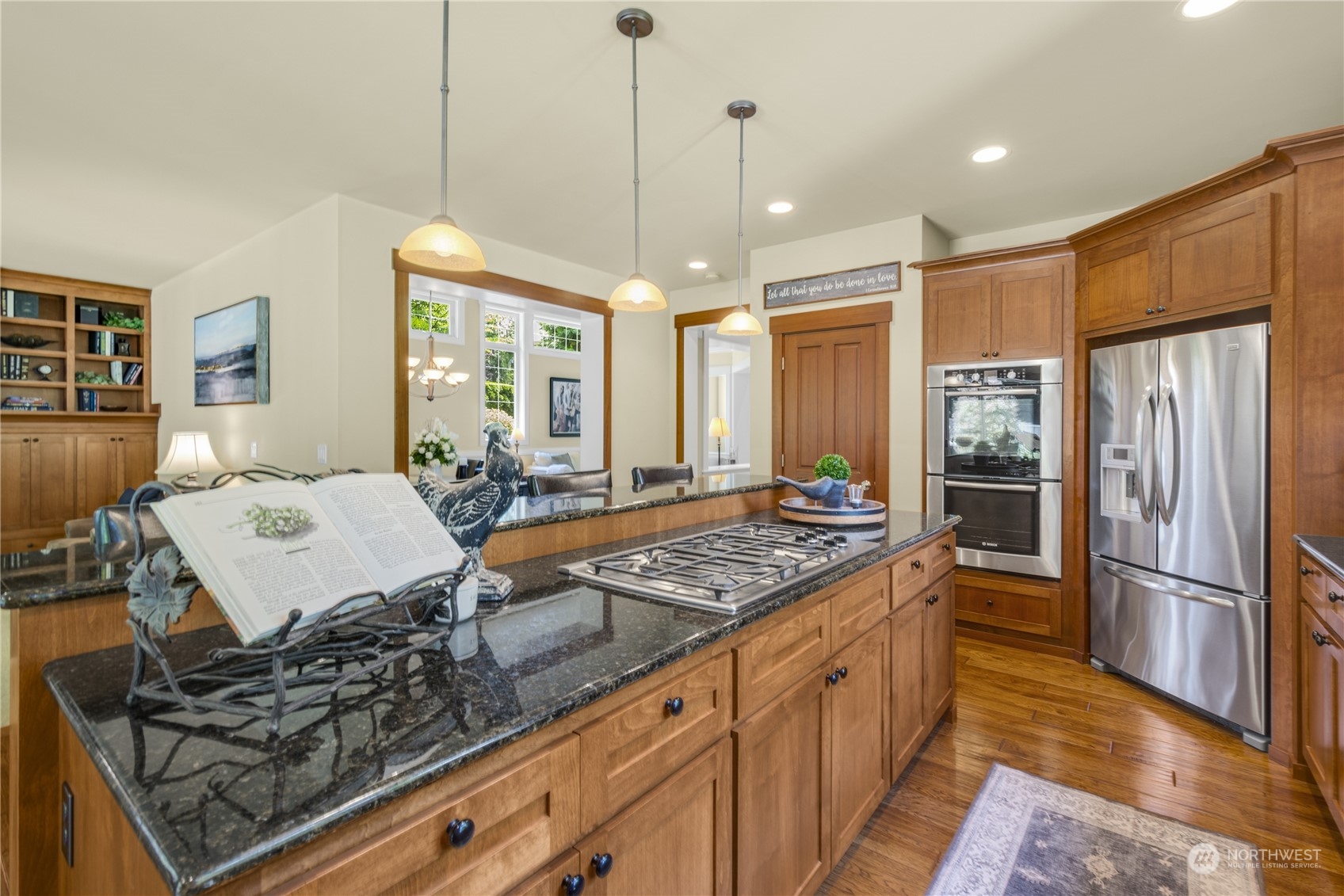 4205 221st Place Southeast Bothell, WA 98021 - Photo 15 of 32 a kitchen with stainless steel appliances granite countertop a stove refrigerator and cabinets