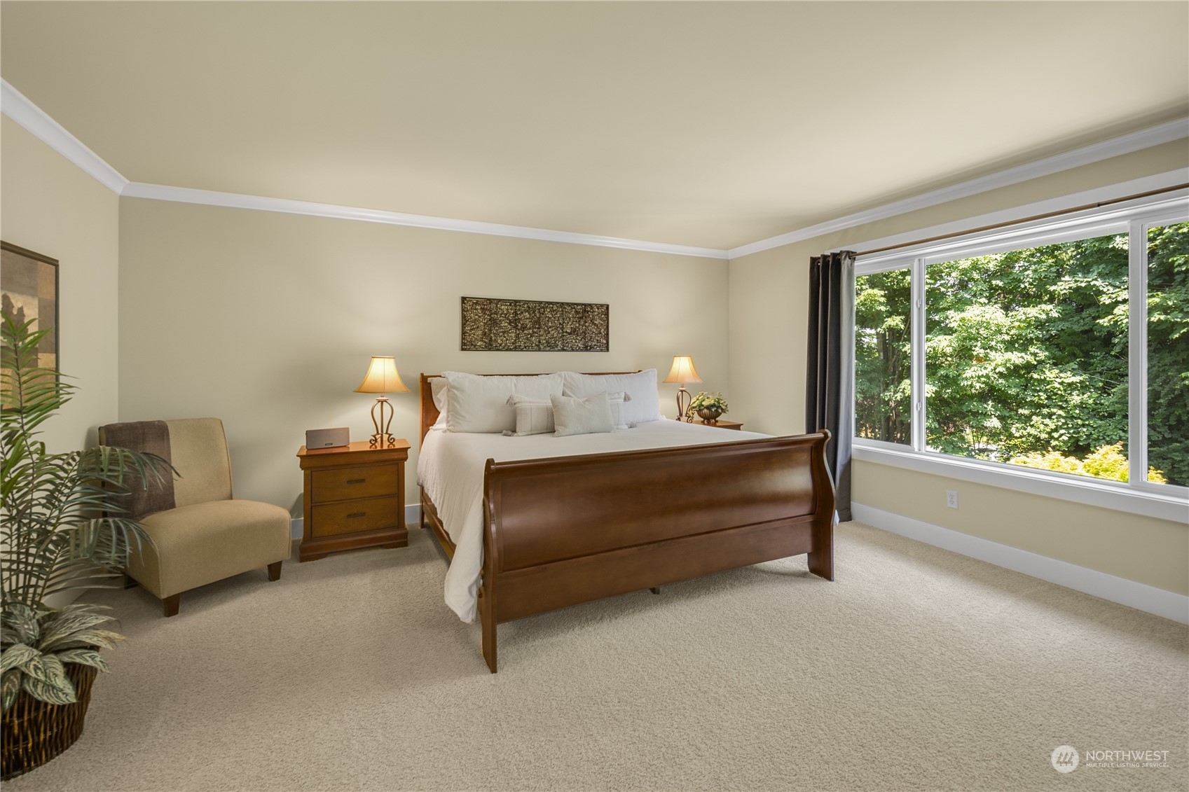 4205 221st Place Southeast Bothell, WA 98021 - Photo 19 of 32 a bedroom with furniture and a large window