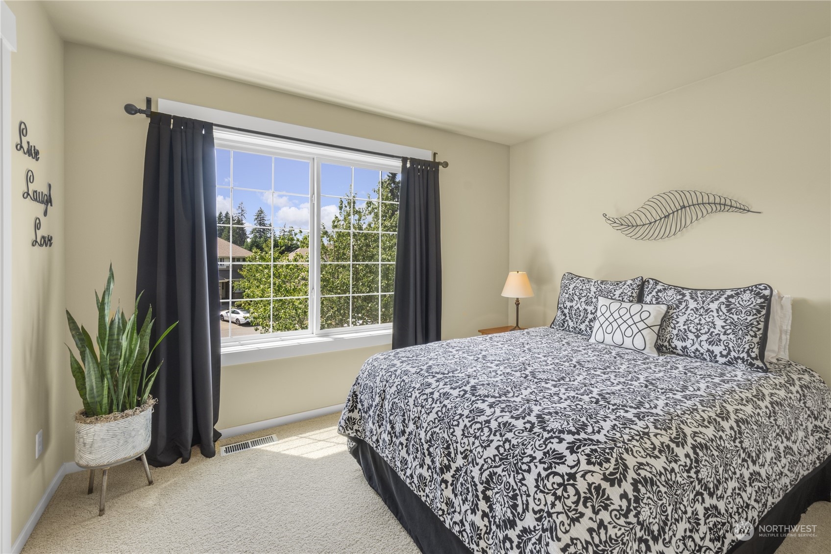 4205 221st Place Southeast Bothell, WA 98021 - Photo 26 of 32 a bedroom with a bed and window