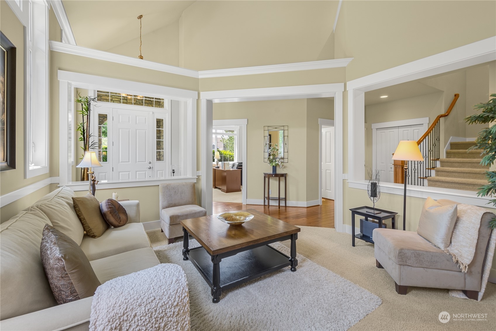 4205 221st Place Southeast Bothell, WA 98021 - Photo 9 of 32 a living room with furniture and a large window