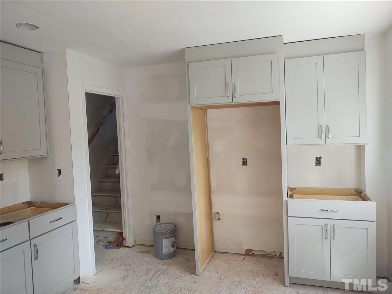 3108 Orton Place Raleigh, NC 27607 - Photo 4 of 8 a room with storage and utility