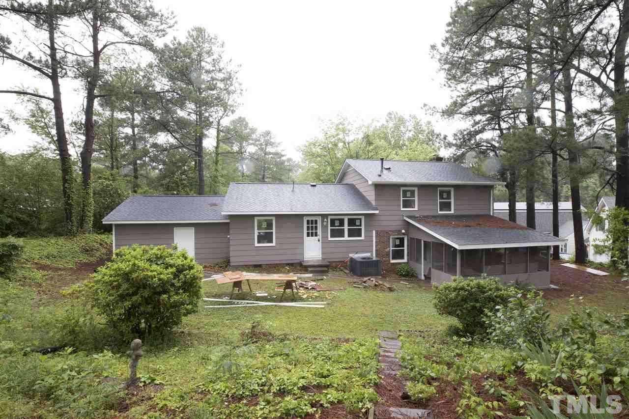 3108 Orton Place Raleigh, NC 27607 - Photo 7 of 8 a front view of a house with garden