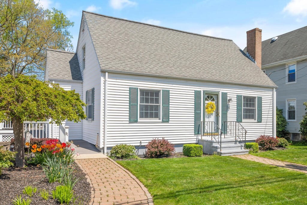 81 Baxter Street Melrose, MA 02176 - Photo 1 of 33 a front view of a house with a yard