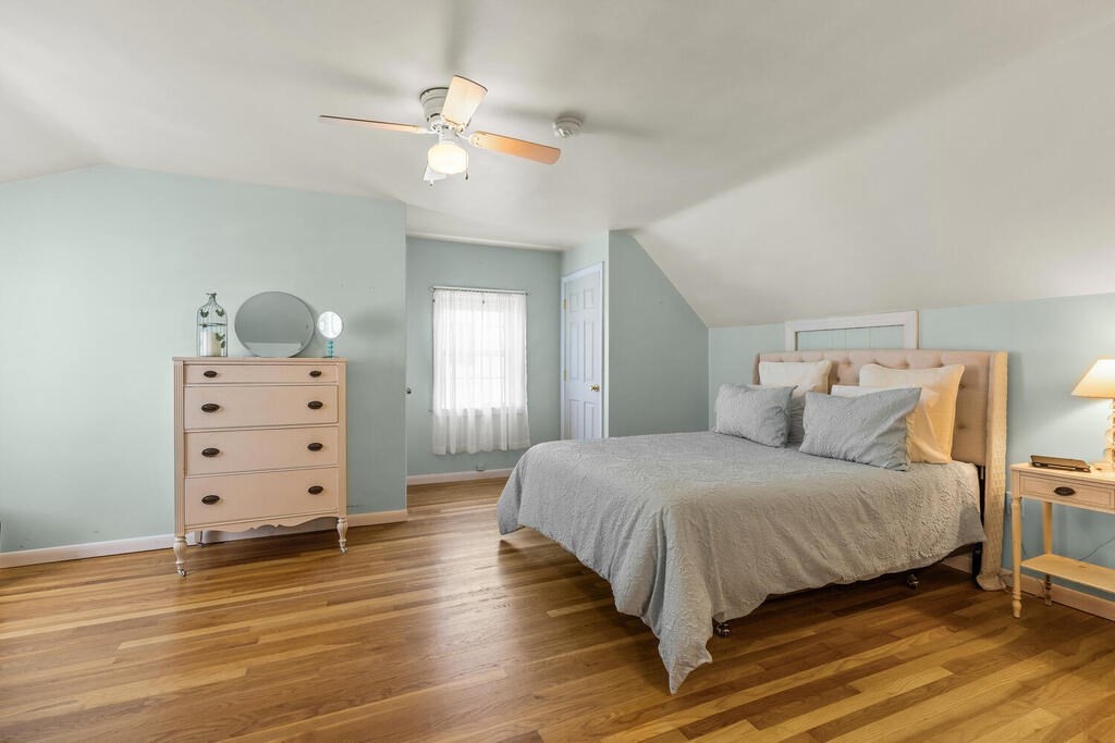 81 Baxter Street Melrose, MA 02176 - Photo 23 of 33 a bedroom with a bed and a dresser
