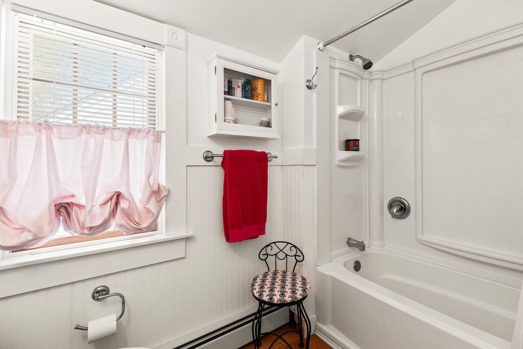 81 Baxter Street Melrose, MA 02176 - Photo 27 of 33 a bathroom with a bathtub and a shower