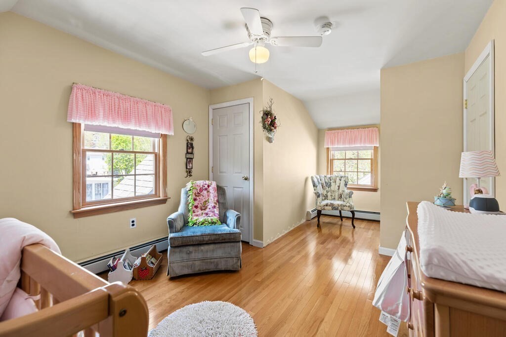 81 Baxter Street Melrose, MA 02176 - Photo 29 of 33 a living room with furniture and a window