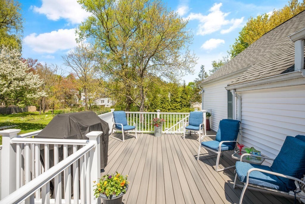 81 Baxter Street Melrose, MA 02176 - Photo 30 of 33 a view of a chairs and table on the wooden floor