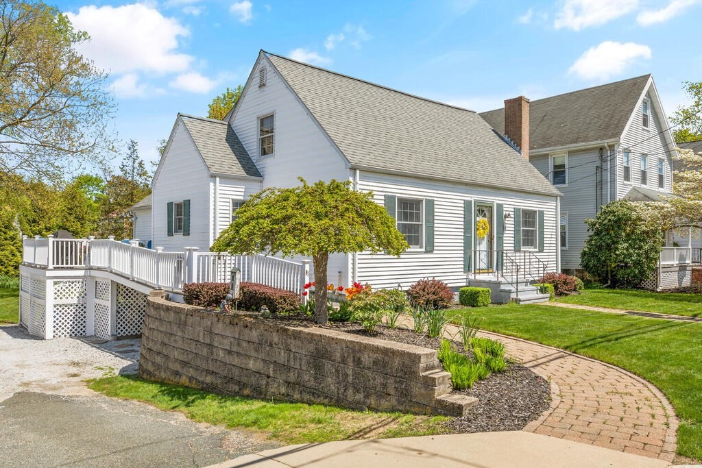 81 Baxter Street Melrose, MA 02176 - Photo 3 of 33 front view of a house with a yard