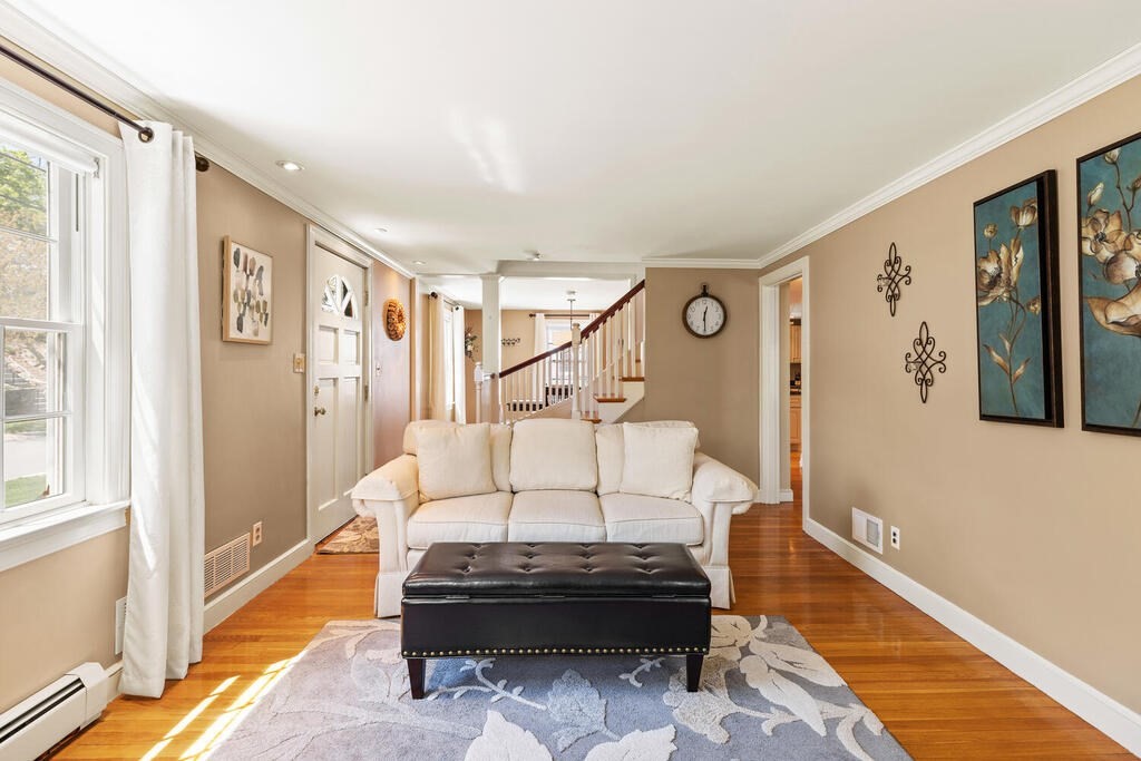 81 Baxter Street Melrose, MA 02176 - Photo 7 of 33 a living room with furniture and a rug