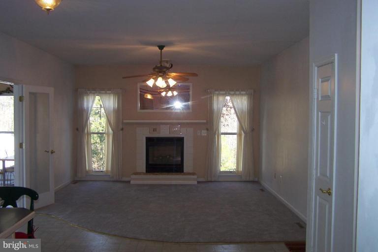 1770 Rudolph Lane Lusby, MD 20657 - Photo 6 of 16 Open Family room to kitchen and sunroom