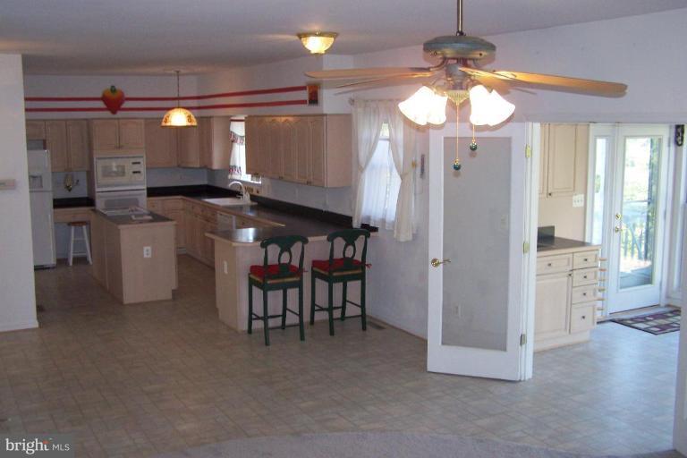 1770 Rudolph Lane Lusby, MD 20657 - Photo 7 of 16 Family room to kitchen