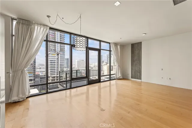 a view of an empty room with a sliding door