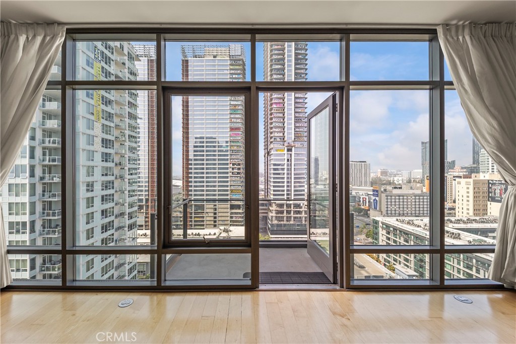 1100 South Hope Street, Unit 1704 Los Angeles, CA 90015 - Photo 12 of 26 a view of a large window with the balcony