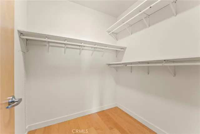 a view of a room with racks on the wall