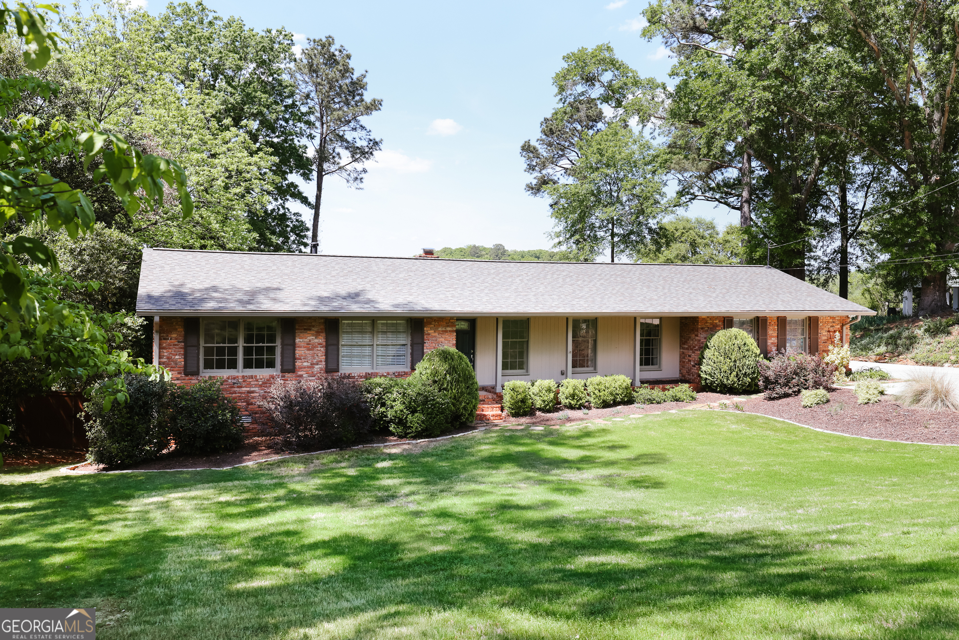 206 Fortson Drive Athens, GA 30606 - Photo 1 of 48 a front view of a house with garden