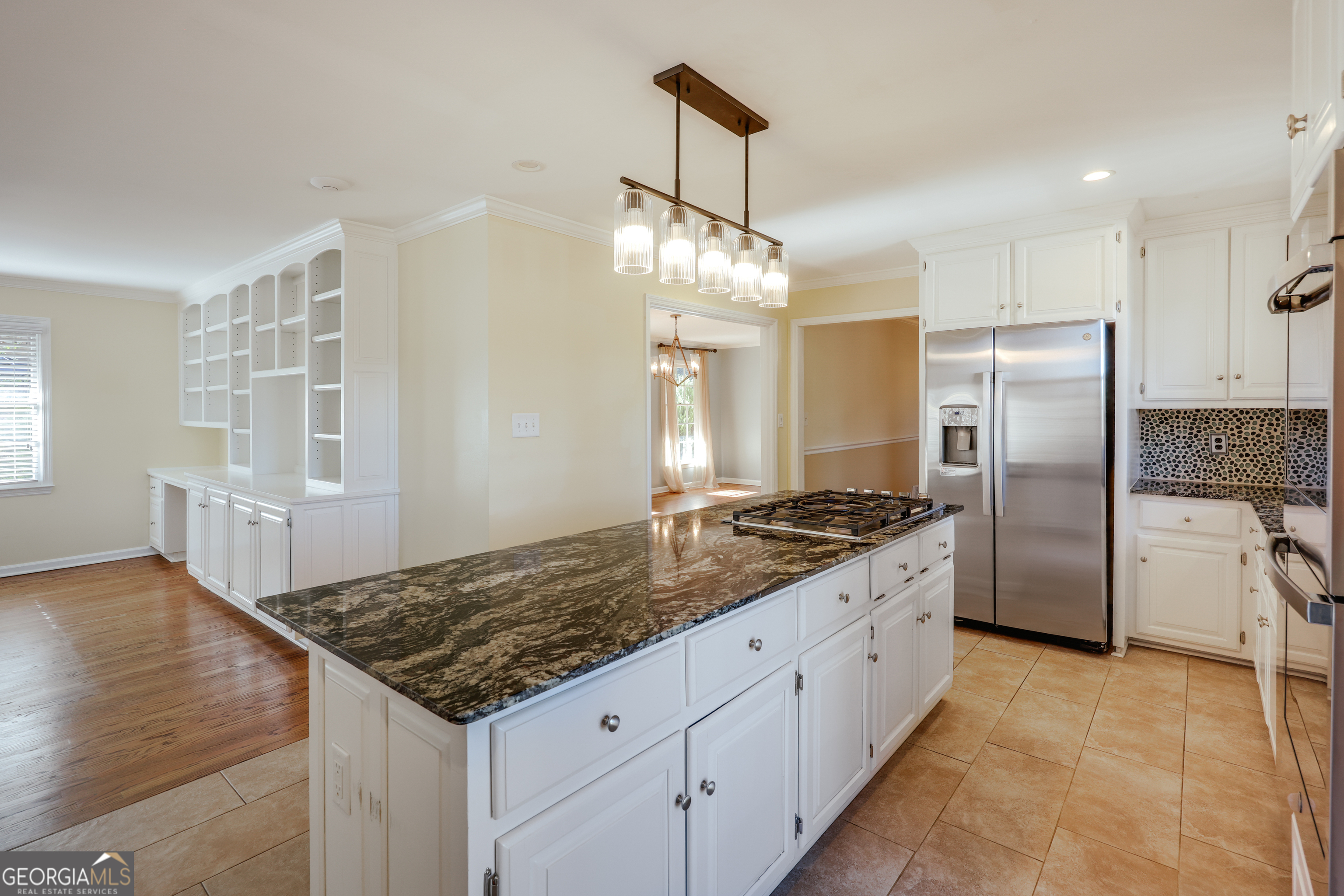 206 Fortson Drive Athens, GA 30606 - Photo 16 of 54 a kitchen with stainless steel appliances granite countertop a sink stove and refrigerator