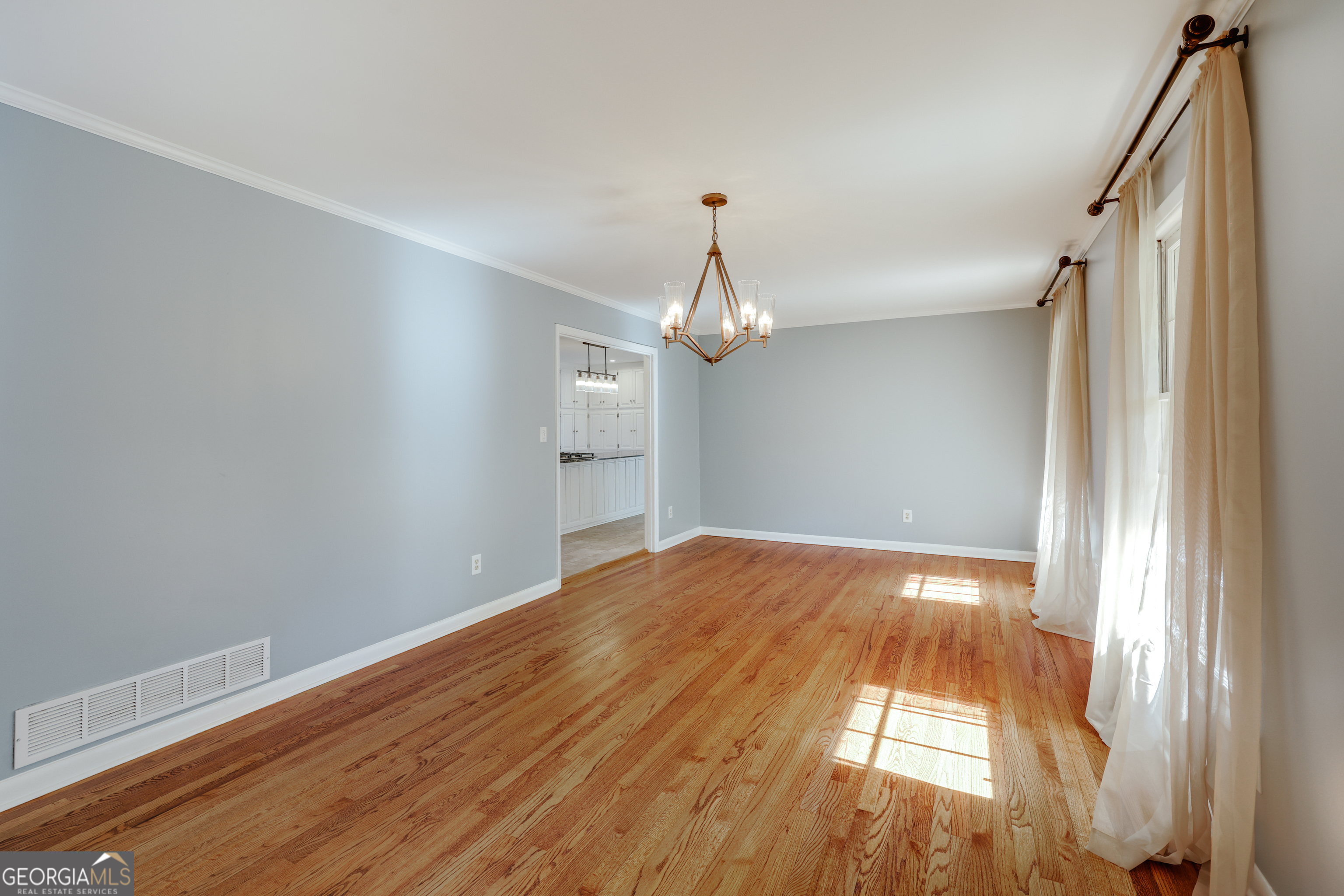 206 Fortson Drive Athens, GA 30606 - Photo 17 of 48 a view of empty room with wooden floor and fan