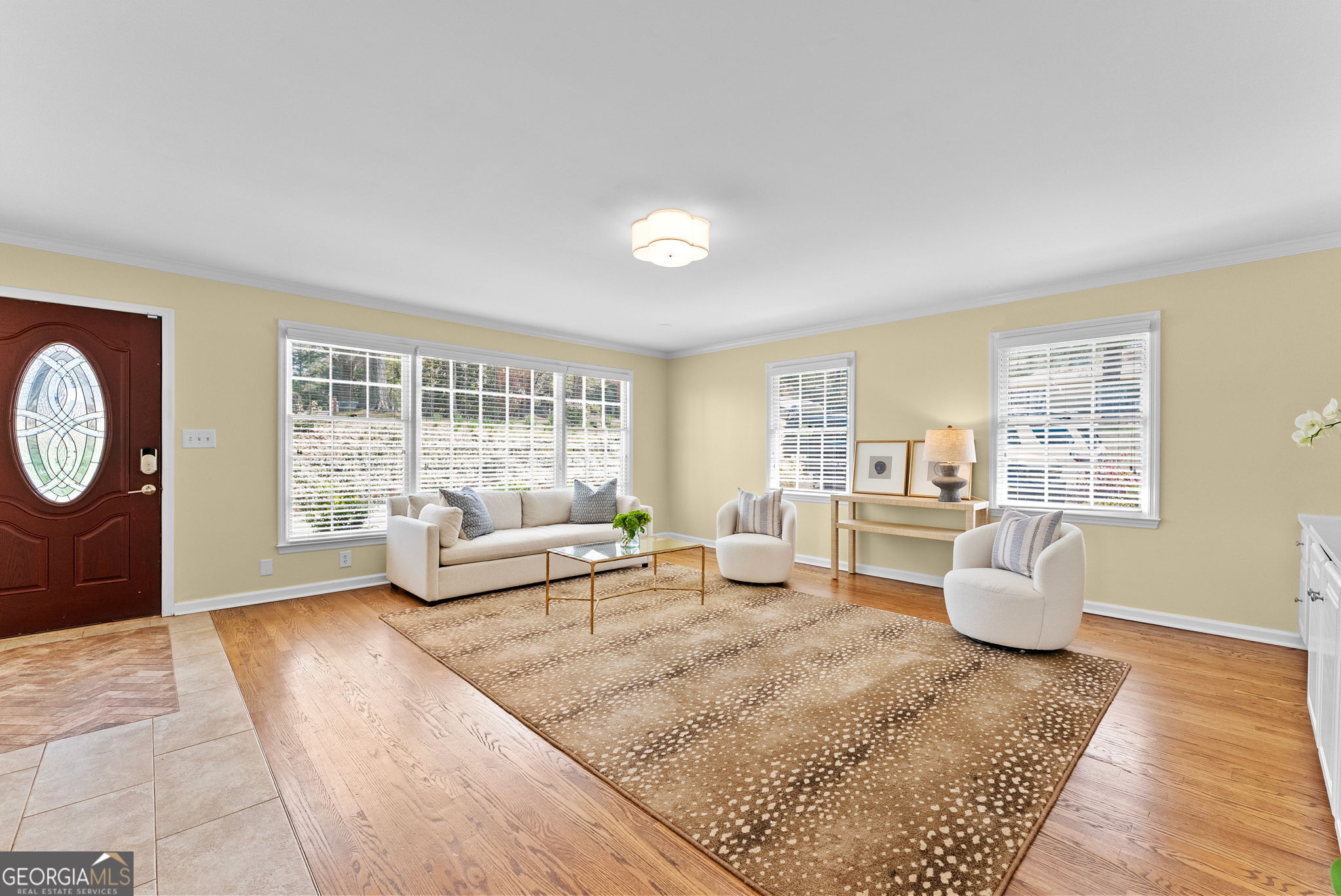 206 Fortson Drive Athens, GA 30606 - Photo 18 of 54 a living room with furniture and a large window