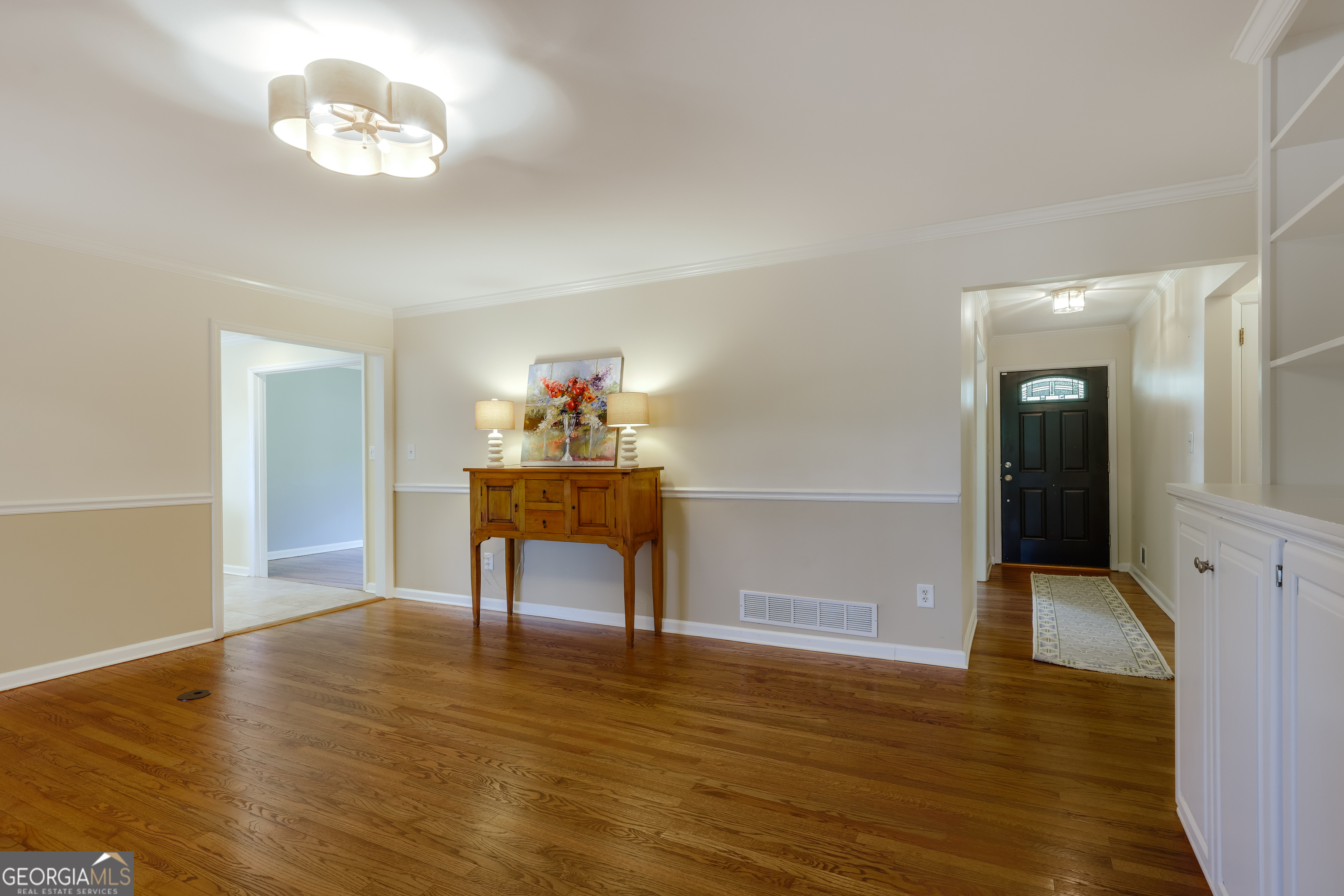 206 Fortson Drive Athens, GA 30606 - Photo 22 of 48 a view of a livingroom with furniture wooden floor and a cabinet