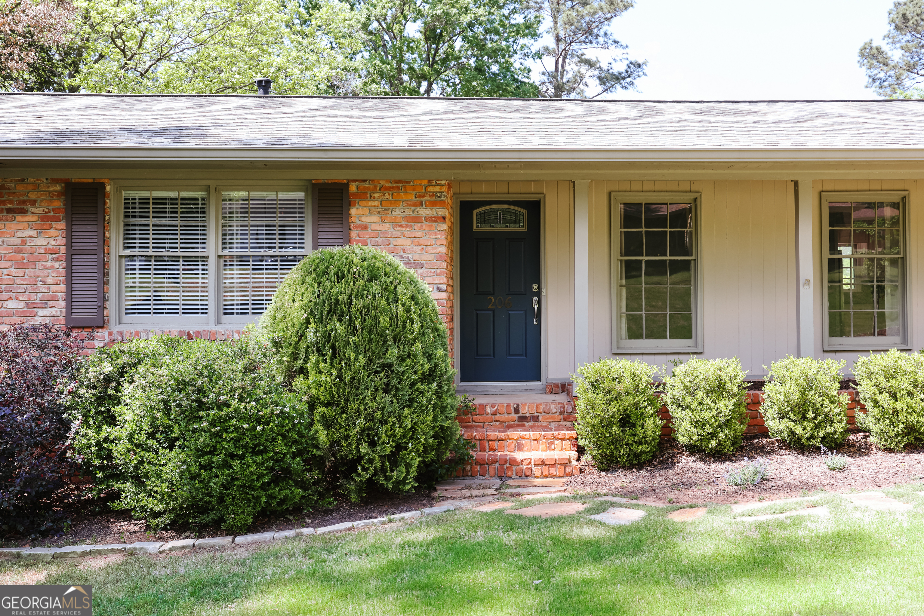 206 Fortson Drive Athens, GA 30606 - Photo 24 of 48 a view of a house with a garden