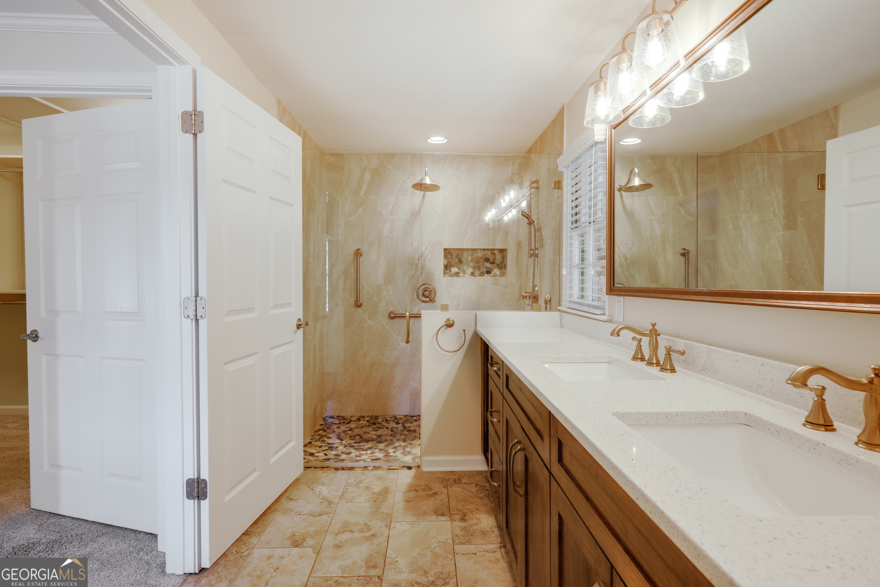 206 Fortson Drive Athens, GA 30606 - Photo 27 of 48 a spacious bathroom with a sink a mirror and a shower
